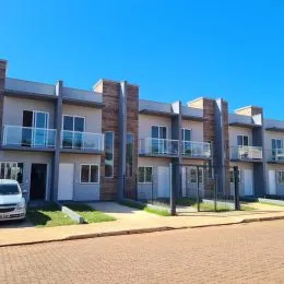 Fachada de um prédio residencial em Lajeado, Brasil com varandas.