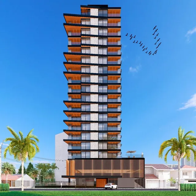 A fachada moderna de um edifício residencial em Lajeado, Brasil, sob um céu azul.