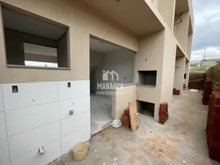 Vista externa de um prédio em Lajeado, Brasil, mostrando uma área de construção.