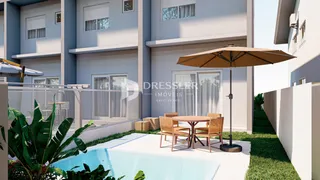 Vista externa de uma residência com piscina e área de lazer em Lajeado.