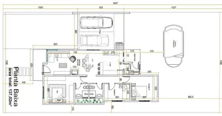 Planta baixa de uma residência mostrando o layout interno dos cômodos.