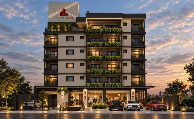 Fachada moderna de um prédio residencial em Lajeado, Brasil, capturada ao pôr do sol.