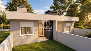 A fachada moderna de uma casa em Lajeado, Brasil, com jardim gramado.