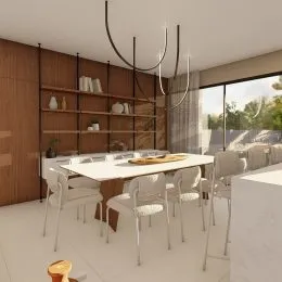 Foto de uma sala de jantar com mesa grande e cadeiras em um ambiente com painéis de madeira.