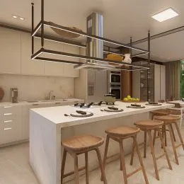 Cozinha moderna com ilha central e bancos de madeira.