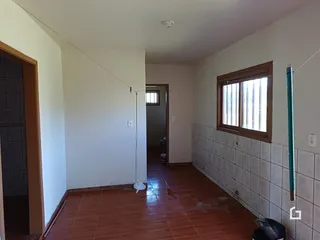 Corredor interno de uma residência em Lajeado, Brasil.
