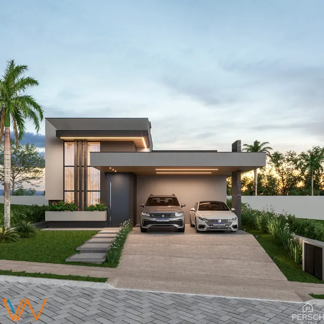 Fachada moderna de uma residência em Lajeado, Brasil, com garagem e paisagismo.