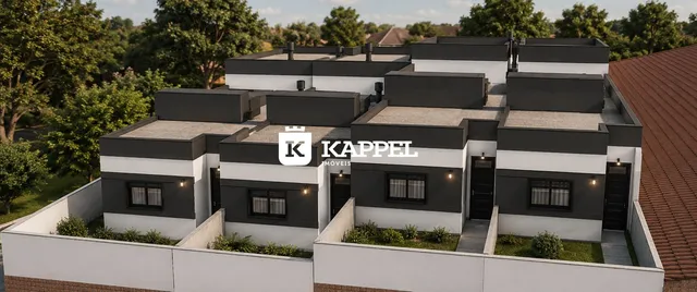 Fachada moderna de uma residência em Lajeado, Brasil, com revestimento escuro e detalhes em branco.