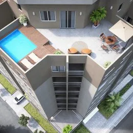 Vista externa de uma residência moderna com piscina e área de lazer.