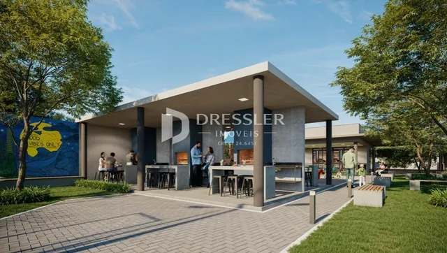Fachada moderna de uma residência em Lajeado com área externa pavimentada.