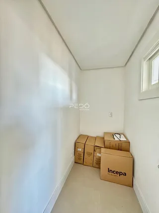 Foto de um corredor interno de uma propriedade em Lajeado.
