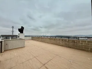 Vista de uma área externa com piso de concreto em Lajeado, Brasil.