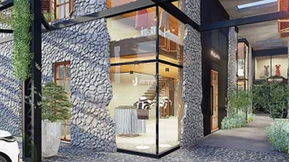 Fachada de uma residência moderna com paredes de pedra e grandes janelas de vidro.