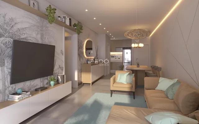 Sala de estar moderna com sofá e televisão em um ambiente claro.