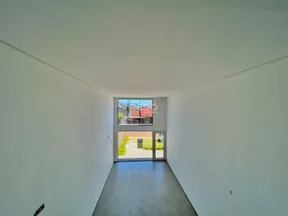 Corredor interno de uma residência em Lajeado, Brasil.