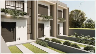Fachada moderna de uma residência em Lajeado com áreas externas.