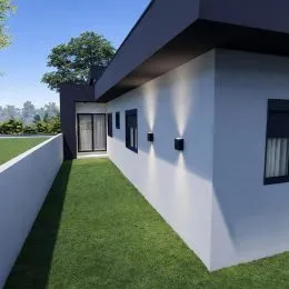 Foto da fachada de uma casa moderna com jardim em Lajeado, Brasil.