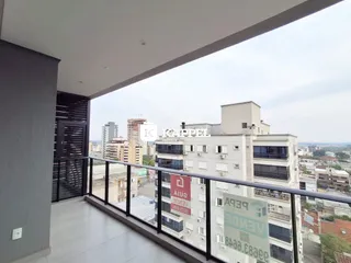 Vista da varanda de um apartamento em um prédio urbano.