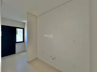 Hall da frente de uma área interna de imóvel em Lajeado.