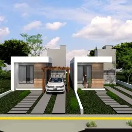 Fachada moderna de uma casa em Lajeado, Brasil, com revestimento de madeira e paisagismo.