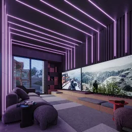 Ambiente interno com iluminação linear moderna e painel de vídeo.