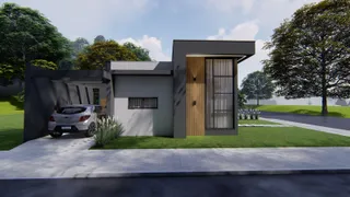 Fachada moderna de uma residência em Lajeado, Brasil, com paisagismo frontal.