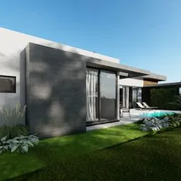 Fachada moderna de uma casa em Lajeado com jardim verde.