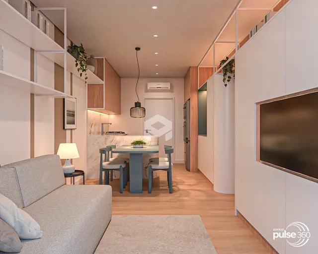 Ambiente moderno de sala de estar e jantar em um apartamento.