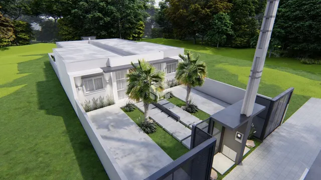 Fachada de uma casa moderna com jardim em Lajeado.