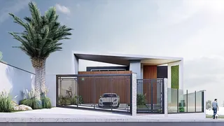 Fachada moderna de uma residência em Lajeado, Brasil, com portão de ferro e jardim.