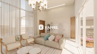 Sala de estar com sofá e poltronas em ambiente claro com grandes janelas.