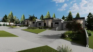 Fachada de uma residência moderna com jardim e entrada pavimentada em Lajeado.