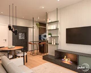 Sala de estar e jantar com lareira em um apartamento moderno.