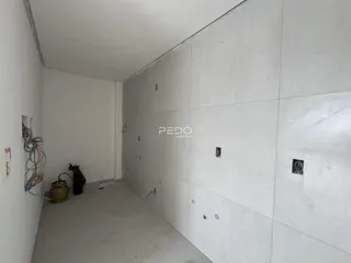 Corredor interno de um imóvel em Lajeado, Brasil.