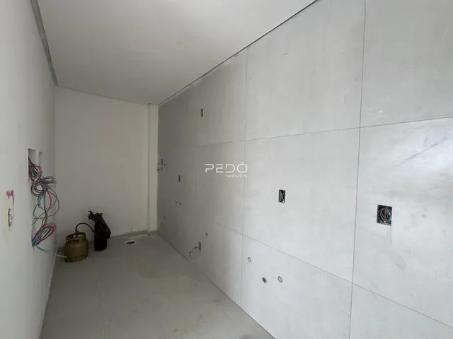 Corredor interno de um imóvel em Lajeado, Brasil.