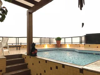 Vista da área da piscina e deck de uma propriedade em Lajeado, Brasil.