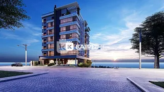 Fachada moderna de um prédio residencial em Lajeado, Brasil, com vista para o oceano.
