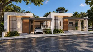 Fachada moderna de uma residência em Lajeado, Brasil, com jardim e entrada pavimentada.