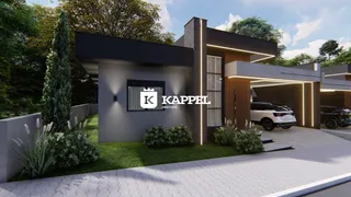 Fachada moderna de uma residência em Lajeado, Brasil, com paisagismo frontal.