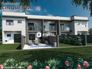 Fachada de um imóvel residencial moderno com varandas e jardim em Lajeado, Brasil.