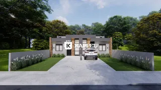 Fachada de uma casa moderna em Lajeado, Brasil, com paisagismo frontal.