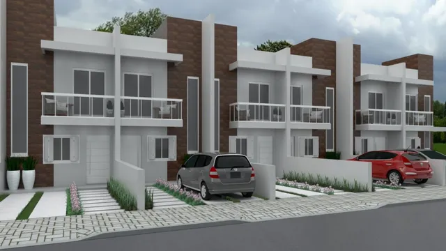 Fachada de um prédio residencial com detalhes em tijolo e varandas em Lajeado, Brasil.