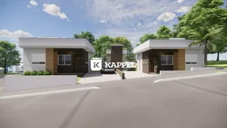 Fachada de uma residência moderna com revestimento branco e detalhes em madeira em Lajeado, Brasil.