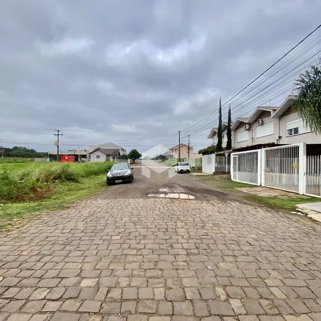 Vista da rua com casas e paisagem em Lajeado, Brasil.