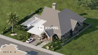 Fachada de uma casa em Lajeado, Brasil, com paisagismo e área de garagem.
