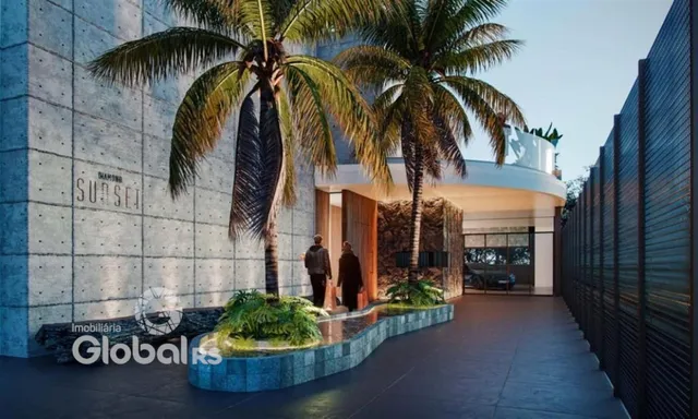 Fachada moderna de um imóvel com palmeiras e paisagismo na entrada.