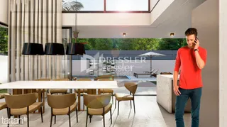 Sala de jantar moderna com grandes janelas.