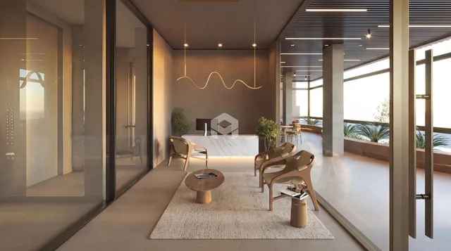 Sala de estar moderna com portas de vidro e vista para o exterior.