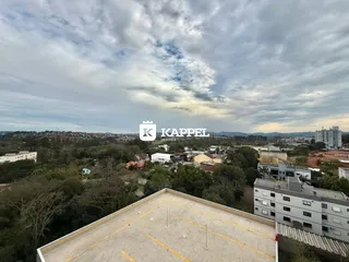 Vista aérea de um terreno com telhado visível em Lajeado, Brasil.