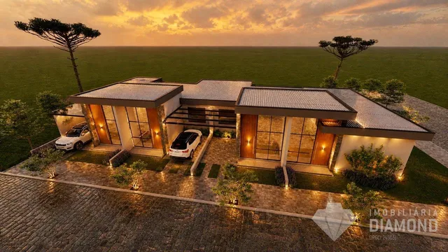 Fachada de uma residência moderna em Lajeado, Brasil, com paisagismo.